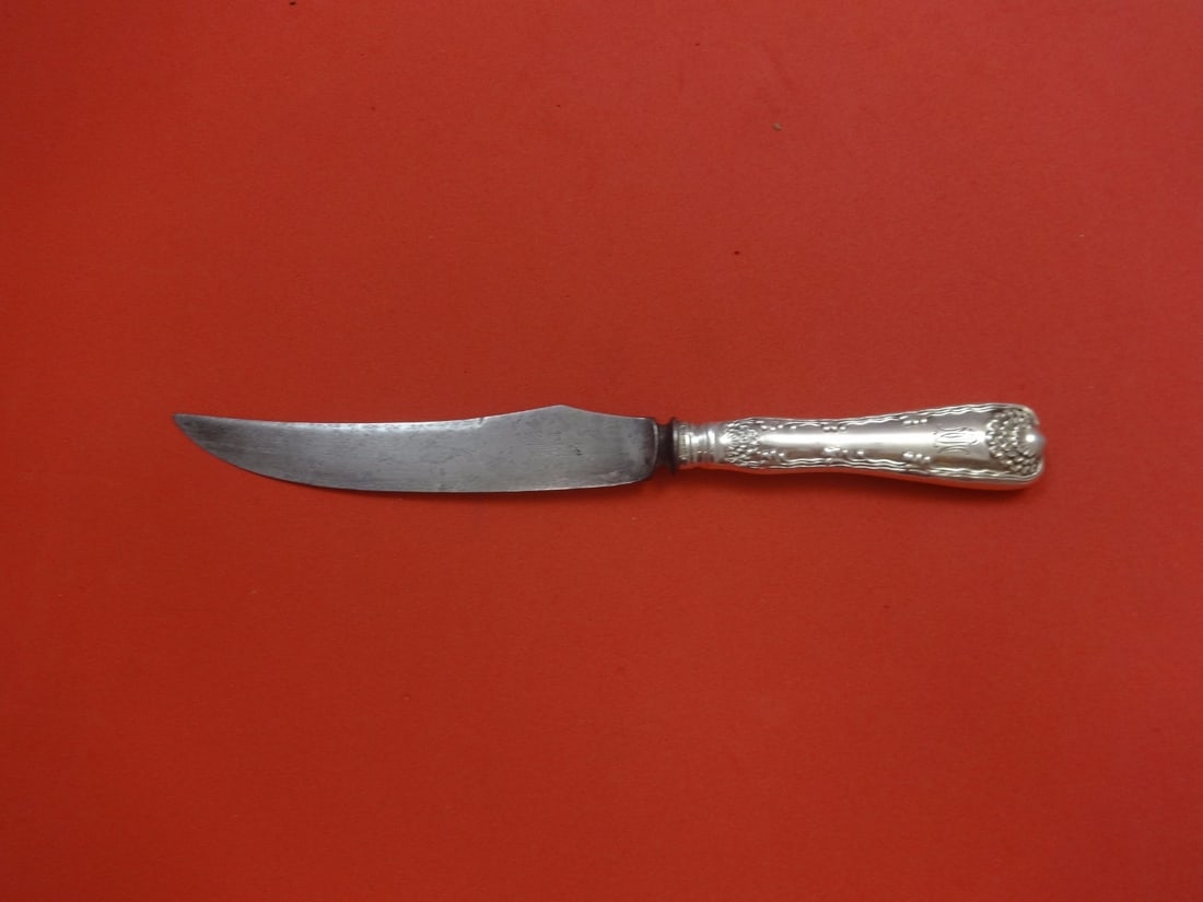 Tiffany & Co. Wave Edge Sterling Silver Game Knife 7 3/4": Tiffany & Co. Wave Edge Sterling Silver Game Knife 7 3/4" Introducing the Wave Edge Game Knife by Tiffany & Co., a stunning piece crafted from sterling silver with a durable carbon steel blade. This k
