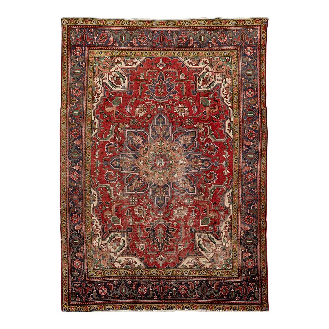 Vintage 1950s Handmade Persian Heriz Wool Rug 8'3 x 10'8 Medallion Motif: Vintage 1950s Handmade Persian Heriz Wool Rug 8'3 x 10'8 Medallion Motif Experience the charm of the 1950s with this handmade Persian Heriz wool rug. Featuring a striking red field complemented by a n