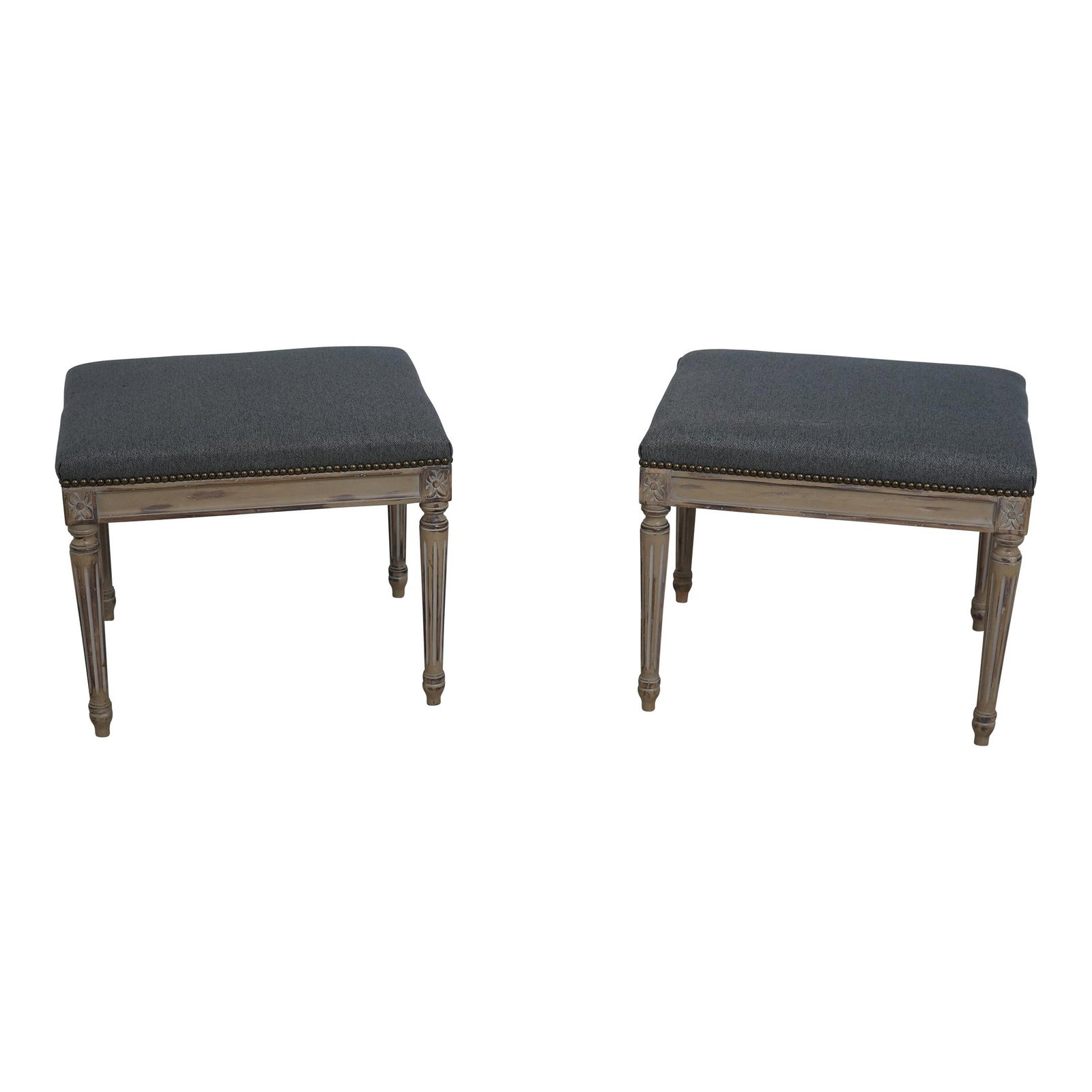 Elegant Pair of 1930s Louis XVI Vintage Stools in White Wood: Elegant Pair of 1930s Louis XVI Vintage Stools in White Wood This elegant pair of vintage stools or ottomans, crafted in the Louis XVI style, dates back to the 1930s and is possibly of French origin. 