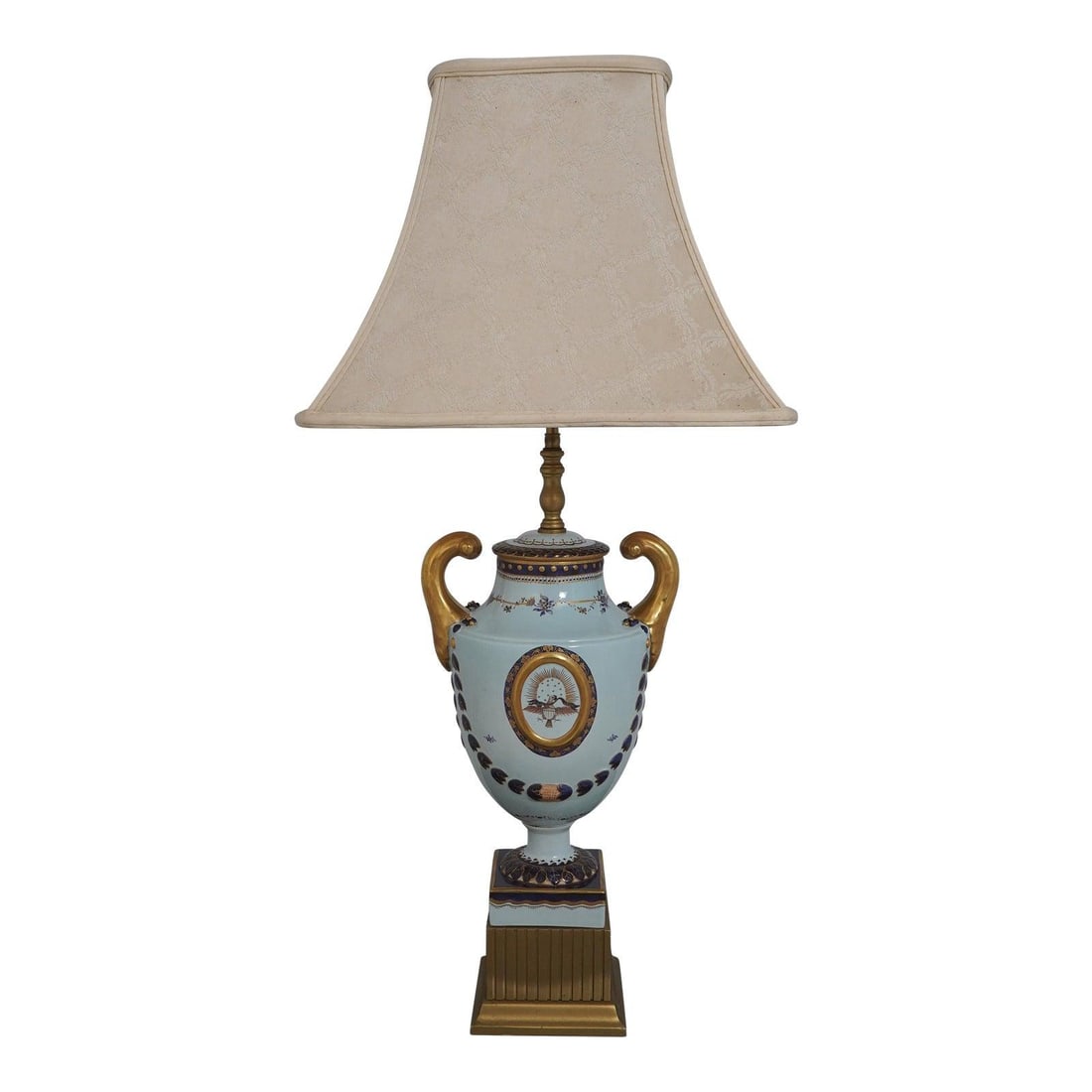 Federal Style Porcelain Urn Table Lamp with Eagle Motif and Cobalt Blue Accents: Federal Style Porcelain Urn Table Lamp with Eagle Motif and Cobalt Blue Accents This vintage Mottahedeh Federal-style table lamp features a classic urn-shaped porcelain body adorned with a presidentia