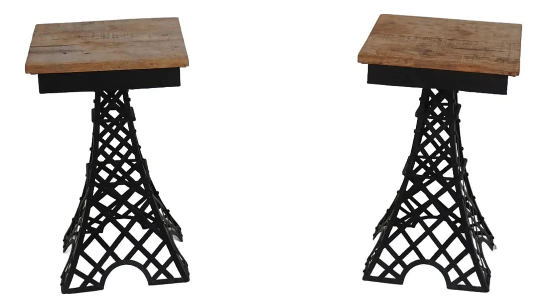 Vintage Pair of Eiffel Tower End Tables with Wood Tops: Vintage Pair of Eiffel Tower End Tables with Wood Tops This exquisite pair of Eiffel Tower end tables features a unique design with fine carved details and high-quality construction. The industrial cr