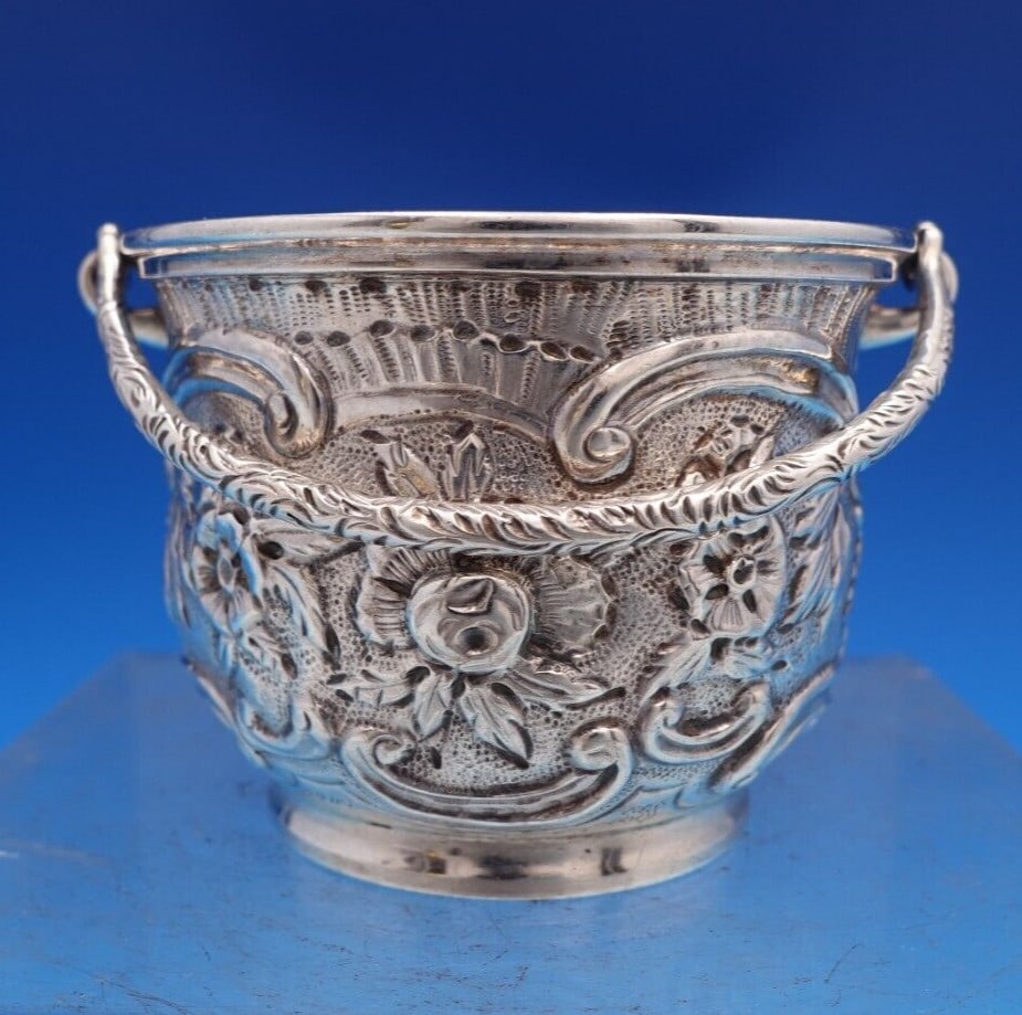 James R Armiger Repousse Sterling Silver Nut Bowl with Swinging Arm: James R Armiger Repousse Sterling Silver Nut Bowl with Swinging Arm This exquisite sterling silver nut bowl, crafted by James R. Armiger, features a charming repousse design and a convenient swinging 