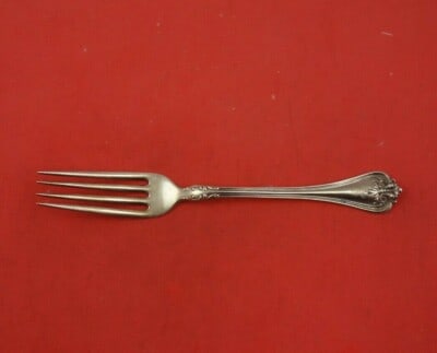 Towle Richmond 7 Sterling Silver Dinner Fork: Towle Richmond 7 Sterling Silver Dinner Fork This is a sterling silver regular fork in the Richmond pattern by Towle. The fork measures 7 inches in length and features an ornate handle design. It is m