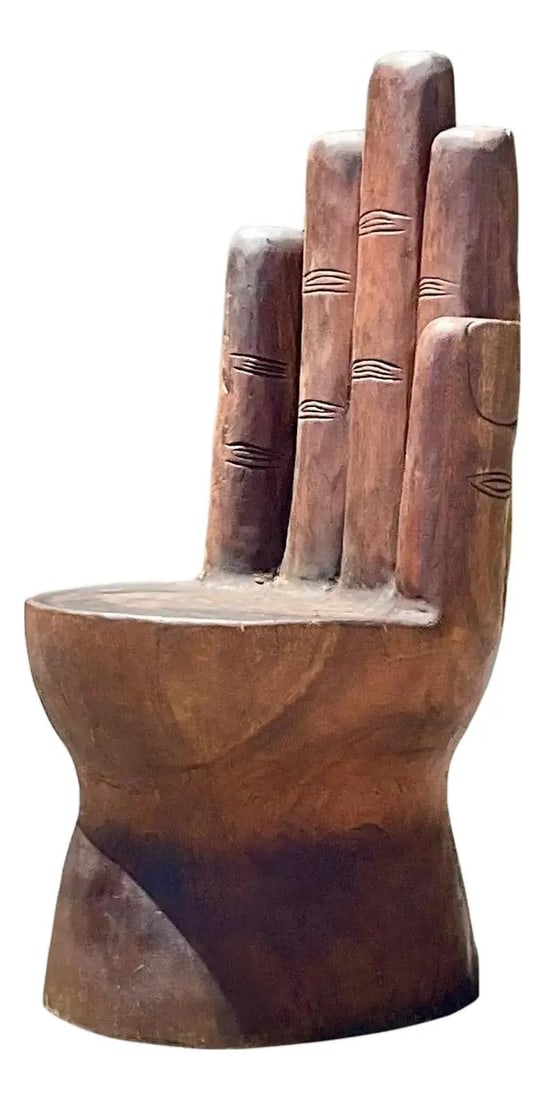 Vintage Boho Hand Carved Wooden Lounge Chair: Vintage Boho Hand Carved Wooden Lounge Chair Discover this unique vintage Boho lounge chair, featuring a chic hand carved hand design crafted from a solid piece of wood. This striking piece was acquir
