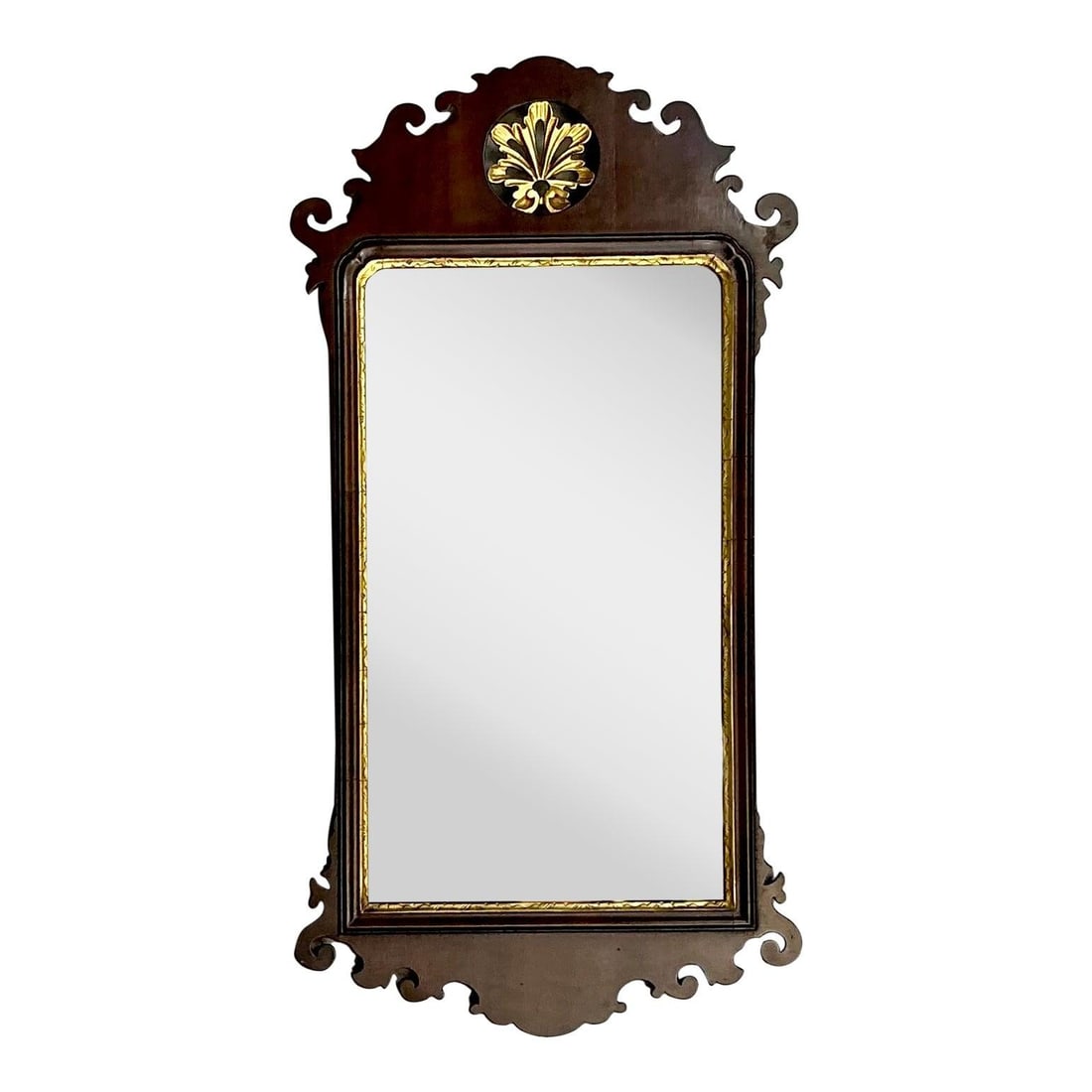 Elegant Vintage Chippendale Mirror with Gilded Crest: Elegant Vintage Chippendale Mirror with Gilded Crest Enhance your home with this exquisite vintage Chippendale-style mirror, a true embodiment of timeless architectural elegance. Crafted from rich mah