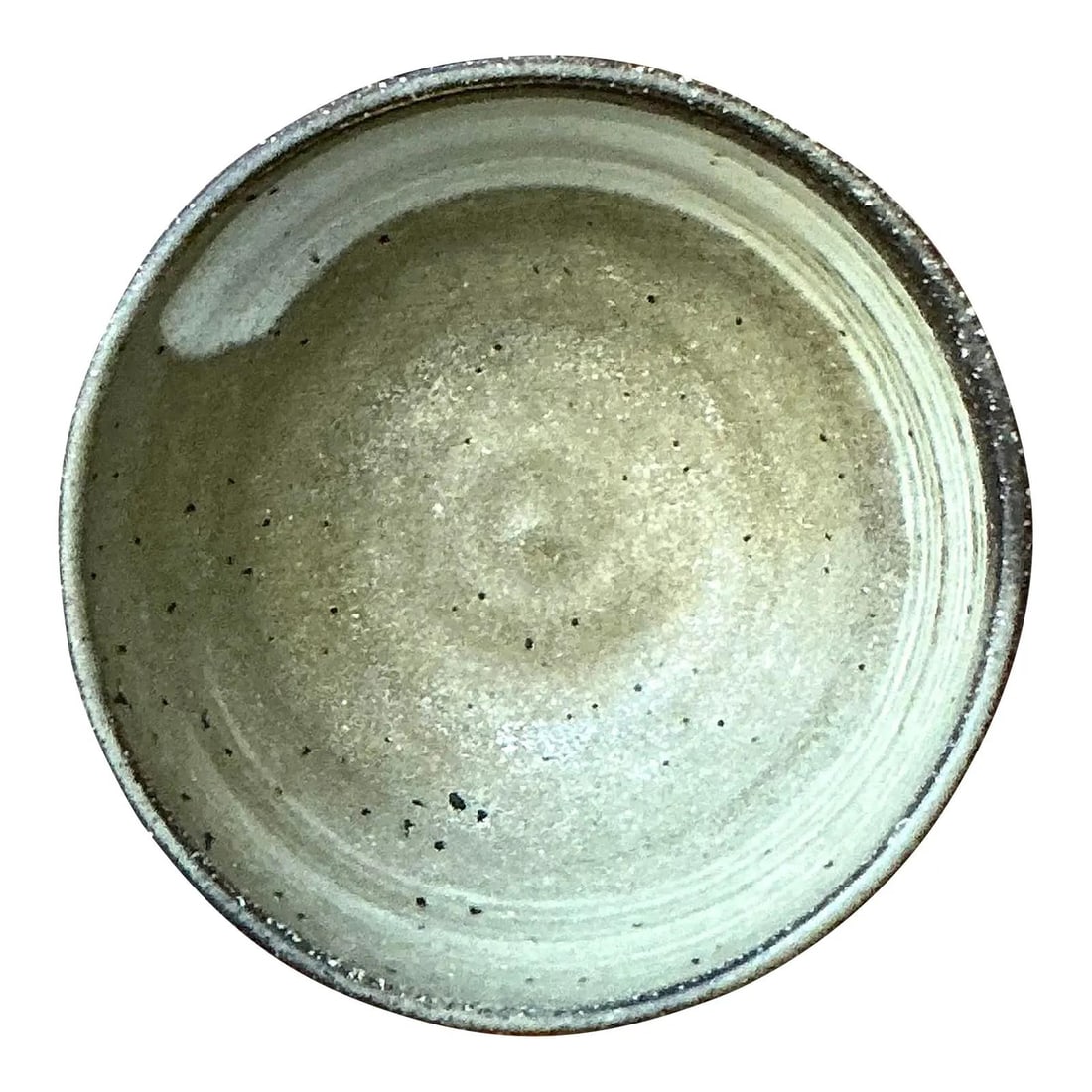 Handcrafted Mid Century Studio Pottery Bowl with Earthy Speckled Glaze: Handcrafted Mid Century Studio Pottery Bowl with Earthy Speckled Glaze This vintage studio pottery bowl showcases hand-thrown craftsmanship with concentric horizontal ridges and a speckled tan or pale