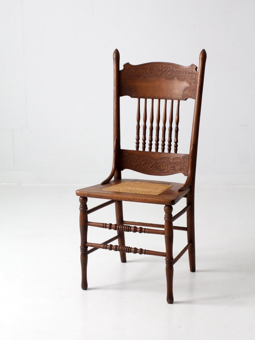 Early 20th Century Antique Press Back Dining Chair with Caned Seat: Early 20th Century Antique Press Back Dining Chair with Caned Seat Discover this exquisite early 20th century Antique Press Back Dining Chair, showcasing a traditional design with a beautifully caned 