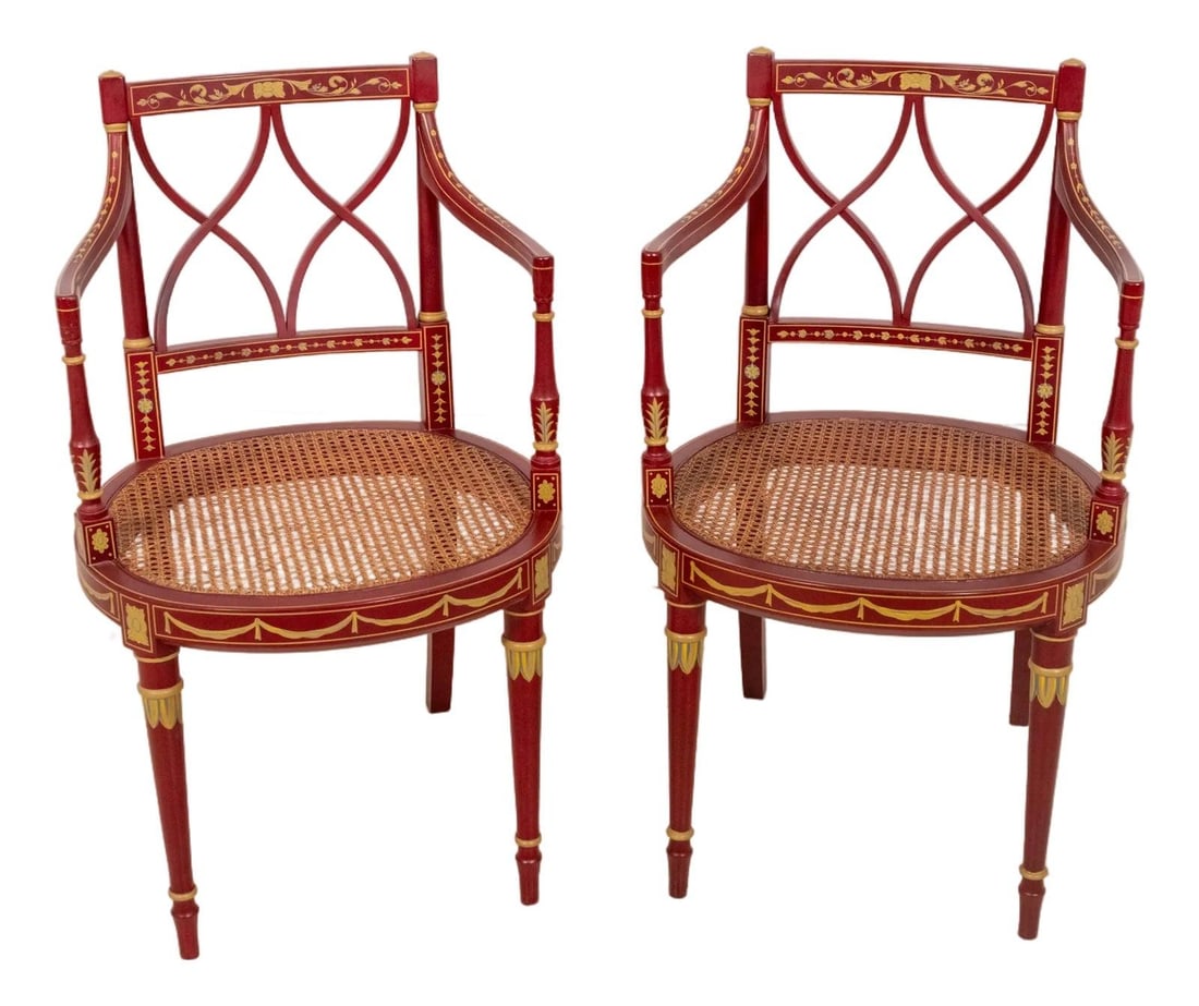 Set of Two Red Hand Painted Adams Style Neoclassical Armchairs with Cane Seats: Set of Two Red Hand Painted Adams Style Neoclassical Armchairs with Cane Seats This pair of Neoclassical Adams style armchairs features hand-painted gold details on red finish frames and finely crafte