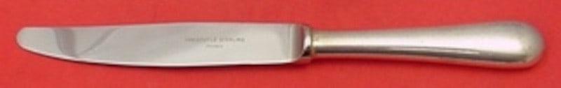 Sterling Silver Dinner Knife Fidelio Baguette Pattern by Christofle 9 3/8 Inch: Sterling Silver Dinner Knife Fidelio Baguette Pattern by Christofle 9 3/8 Inch This dinner knife features a sterling silver hollow handle and a stainless steel blade in the Fidelio, also known as Bagu