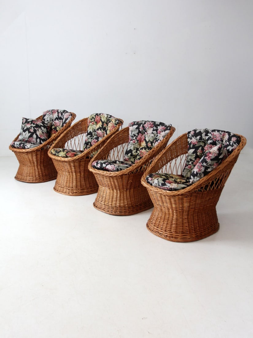 Set of 4 Vintage Rattan Barrel-Back Chairs with Floral Cushions: Set of 4 Vintage Rattan Barrel-Back Chairs with Floral Cushions Enhance your living space with this elegant set of four vintage rattan chairs, showcasing a charming barrel-back design handwoven from n