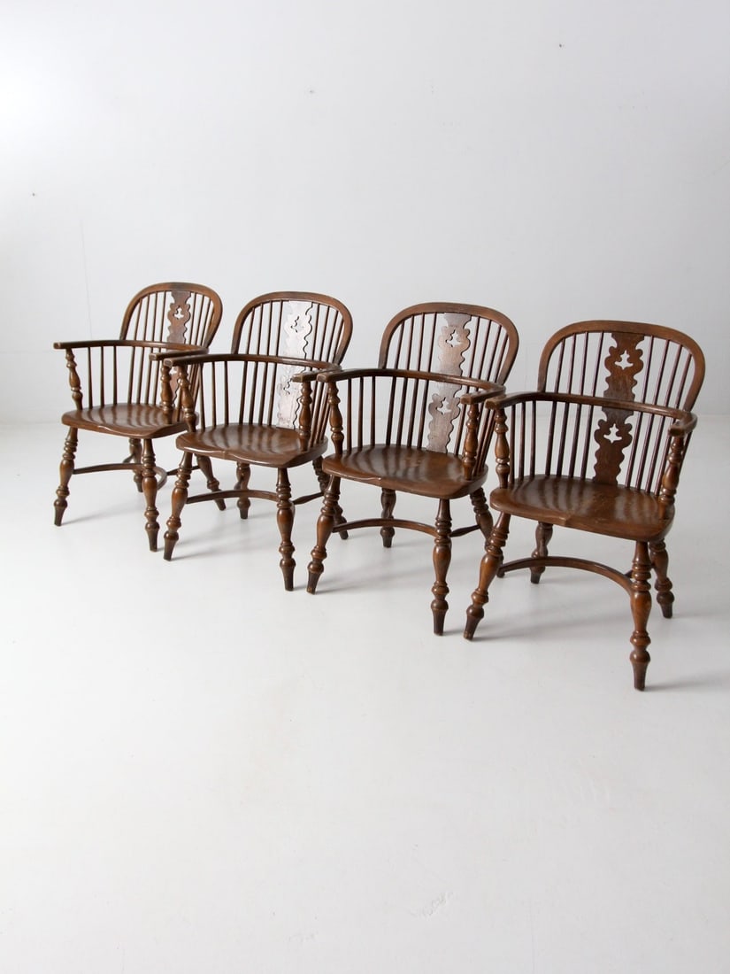 Set of Four Mid Century Windsor Armchairs from Conant Ball: Set of Four Mid Century Windsor Armchairs from Conant Ball This set of four Conant Ball Windsor armchairs from the mid-20th century features sculpted plank seats, turned legs with stretchers, and gent