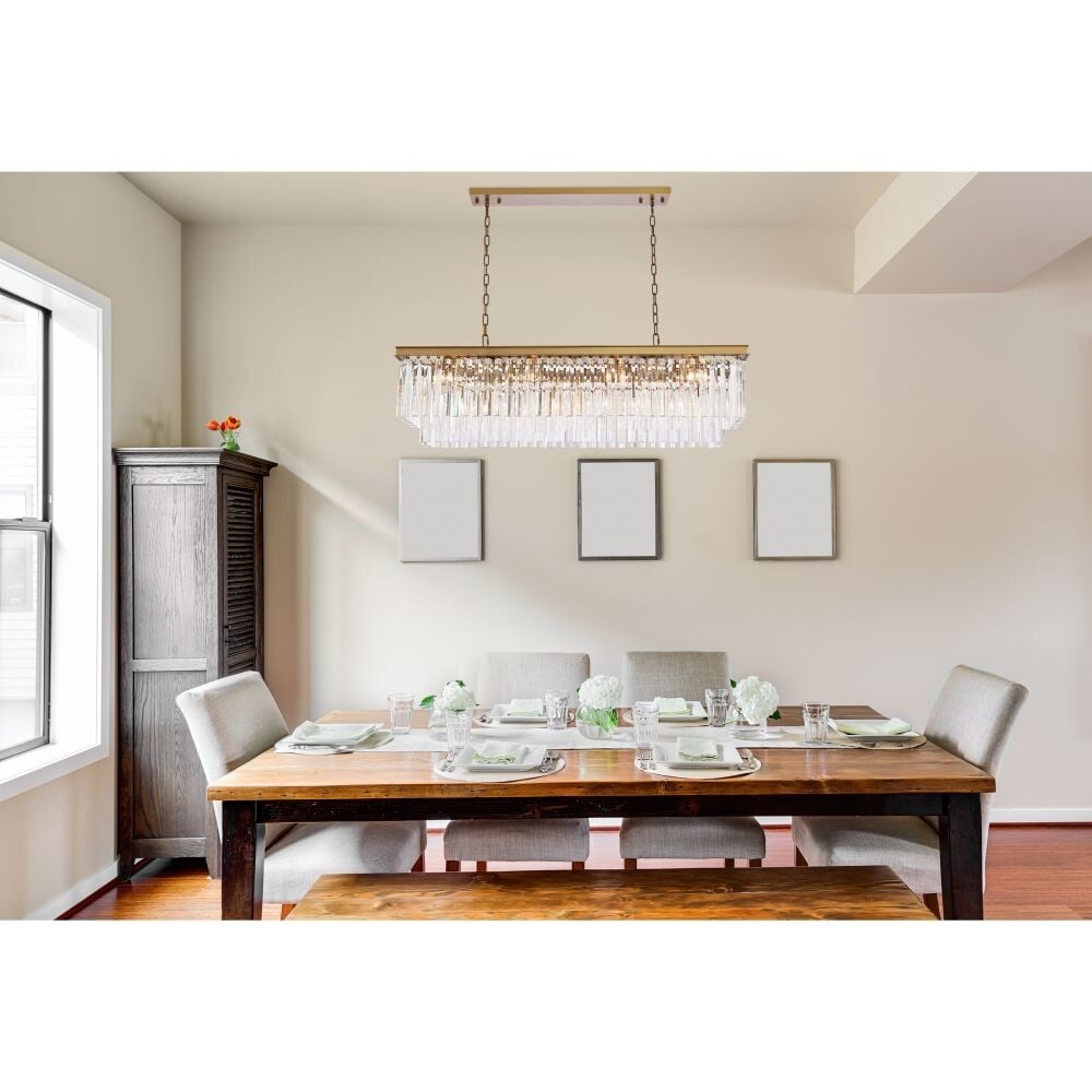 Satin Gold Crystal Chandelier Sydney 12 Light 50 Inch: Satin Gold Crystal Chandelier Sydney 12 Light 50 Inch This modern crystal chandelier features a satin gold finish and a rectangular design, making it an elegant centerpiece for dining rooms, kitchens,