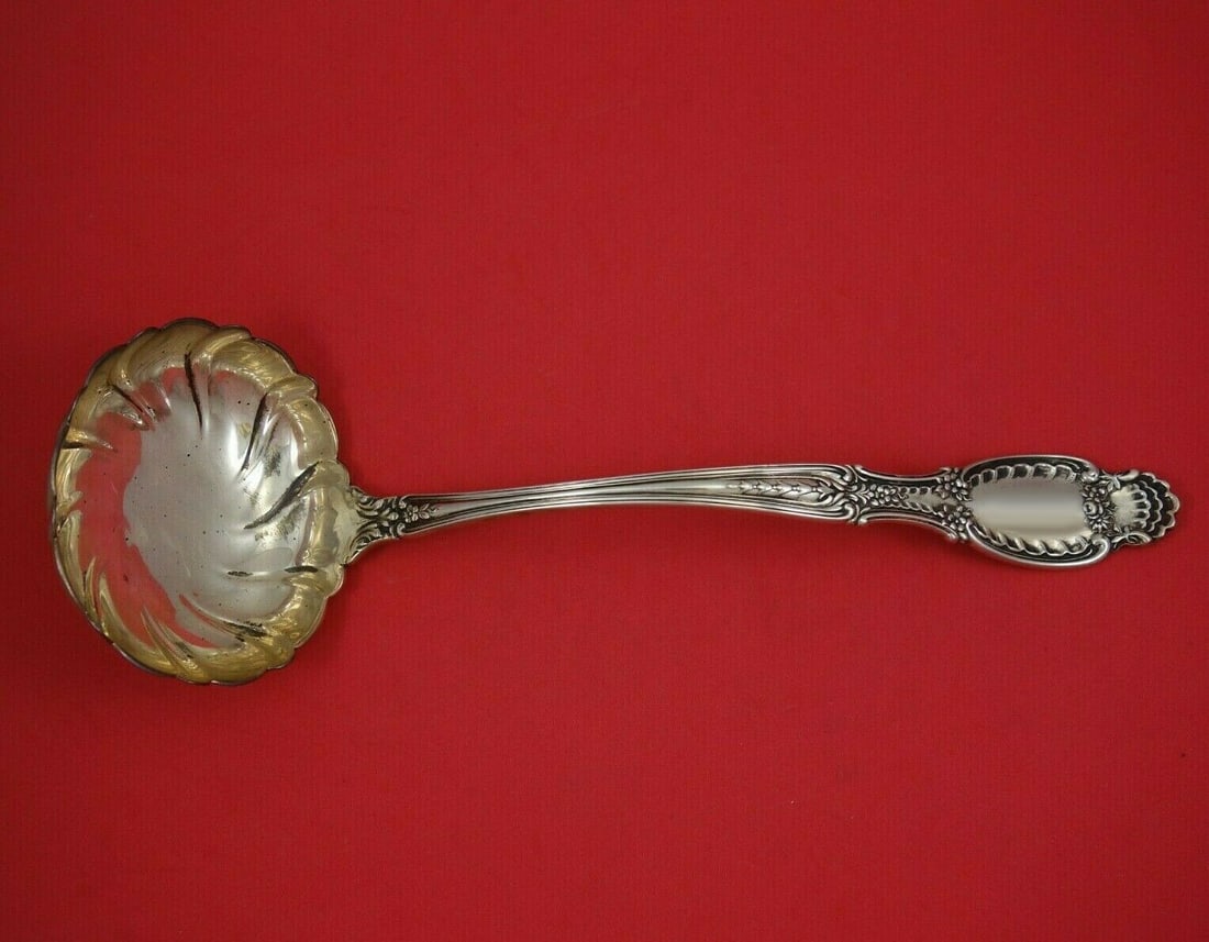Tiffany & Co Richelieu Sterling Silver Soup Ladle Fluted 12.5": Tiffany & Co Richelieu Sterling Silver Soup Ladle Fluted 12.5" This exquisite 12 1/2" soup ladle is crafted from sterling silver and features the elegant Richelieu pattern by Tiffany & Co. Dating back