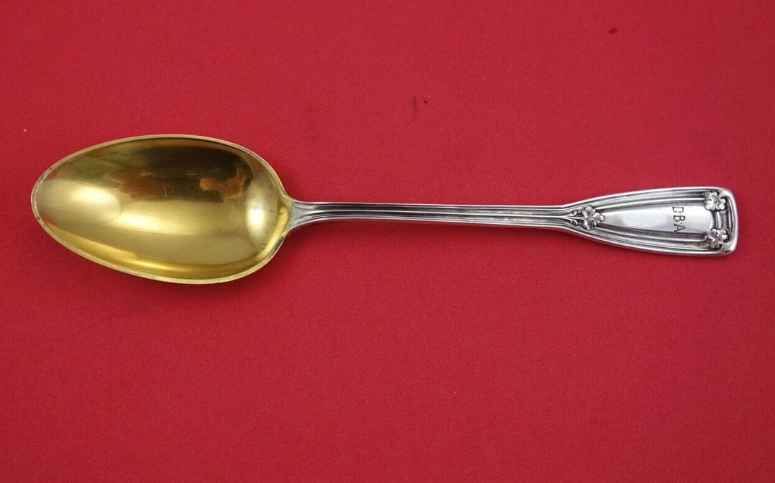 Tiffany & Co Saint Dunstan Sterling Silver Pap Spoon Gold Washed 6 1/4": Tiffany & Co Saint Dunstan Sterling Silver Pap Spoon Gold Washed 6 1/4" This exquisite spoon from Tiffany & Co. features the elegant Saint Dunstan pattern, crafted in high-quality sterling silver with