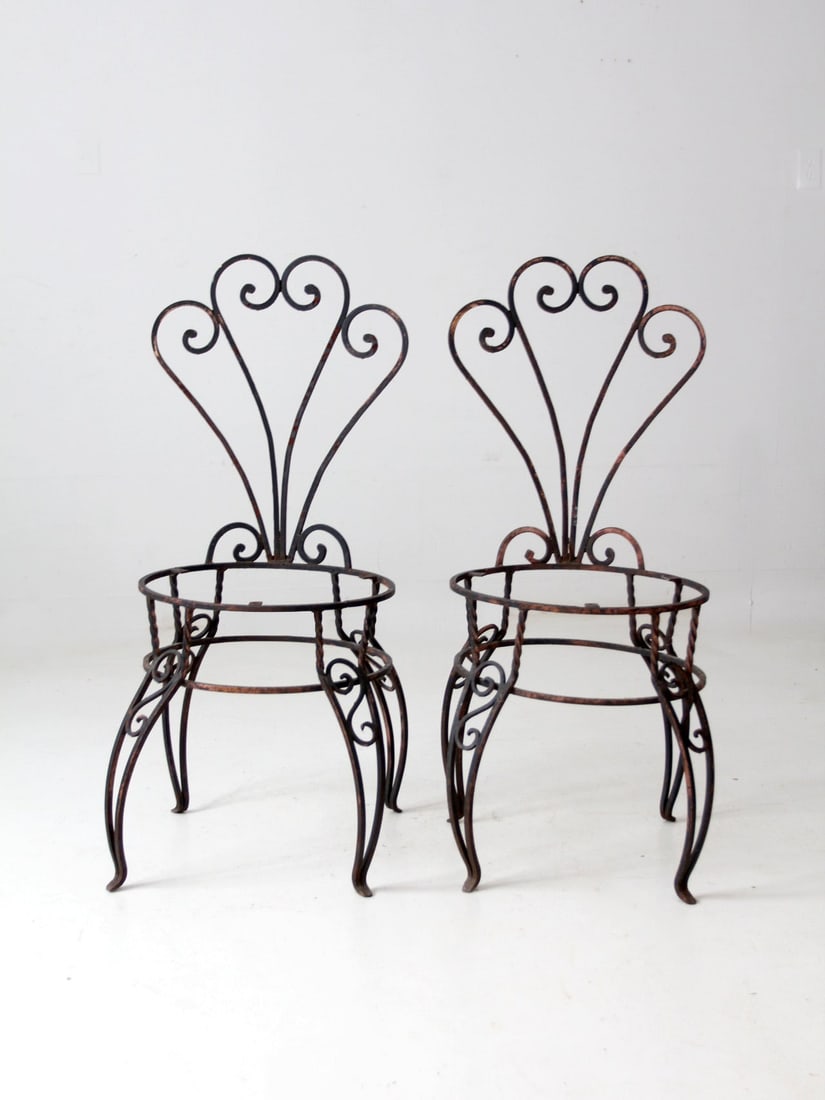 Charming Vintage Wrought Iron Garden Chairs Pair Black Metal: Charming Vintage Wrought Iron Garden Chairs Pair Black Metal This charming pair of vintage wrought iron garden chairs is a perfect addition to any outdoor space. The elegant black metal design feature