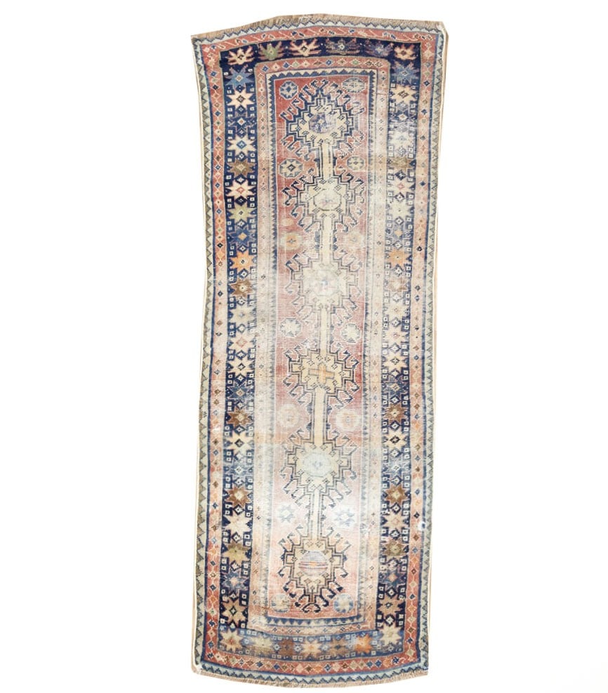 Hand Knotted Wool Tribal Floral Runner Rug 3'1 x 8'1: Hand Knotted Wool Tribal Floral Runner Rug 3'1 x 8'1 This semi-antique hand-knotted runner rug features a tribal floral pattern in muted tones of rusty red, cream, navy blue, and brown. Crafted from w