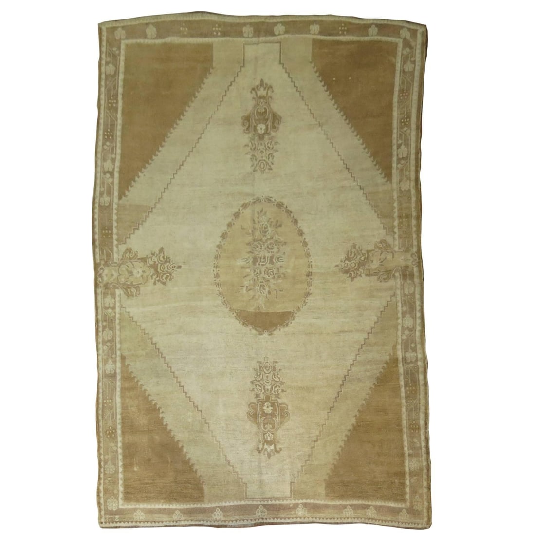 Turkish Kars Wool Medallion Rug 6'7 x 10'2: Turkish Kars Wool Medallion Rug 6'7 x 10'2 This vintage Turkish Kars carpet from the 20th century features an elegant open field central medallion design in shades of brown and khaki. Crafted from woo