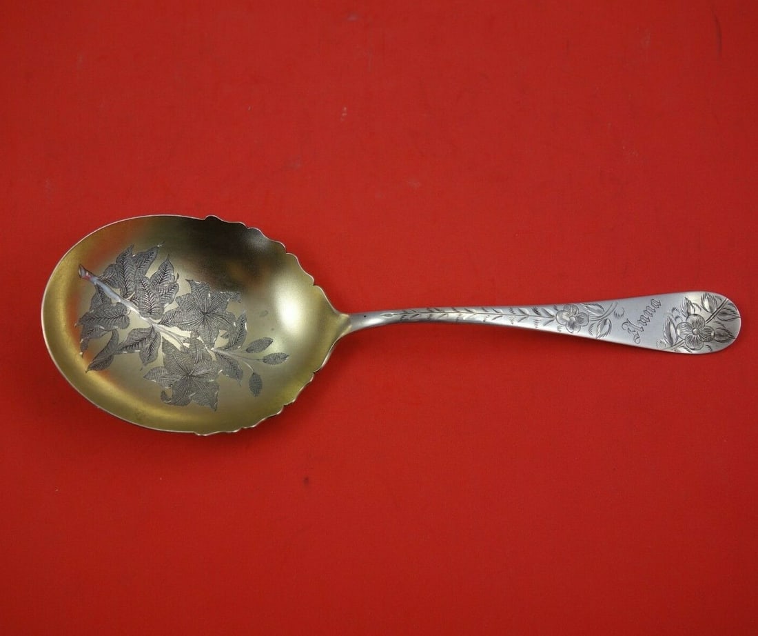 Towle Sterling Silver Gold Washed Berry Spoon 9" Heirloom #43: Towle Sterling Silver Gold Washed Berry Spoon 9" Heirloom #43 This exquisite berry spoon from Towle is crafted from sterling silver and features a beautiful gold wash with a bright-cut design, measuri