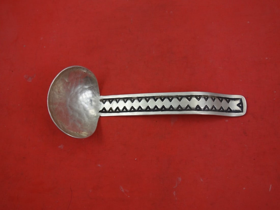 James Fox Native American Sterling Silver Gravy Ladle Hand Wrought 7 1/4 Inches: James Fox Native American Sterling Silver Gravy Ladle Hand Wrought 7 1/4 Inches This exquisite Native American sterling silver gravy ladle is crafted by James Fox. Measuring 7 1/4 inches, the ladle fe
