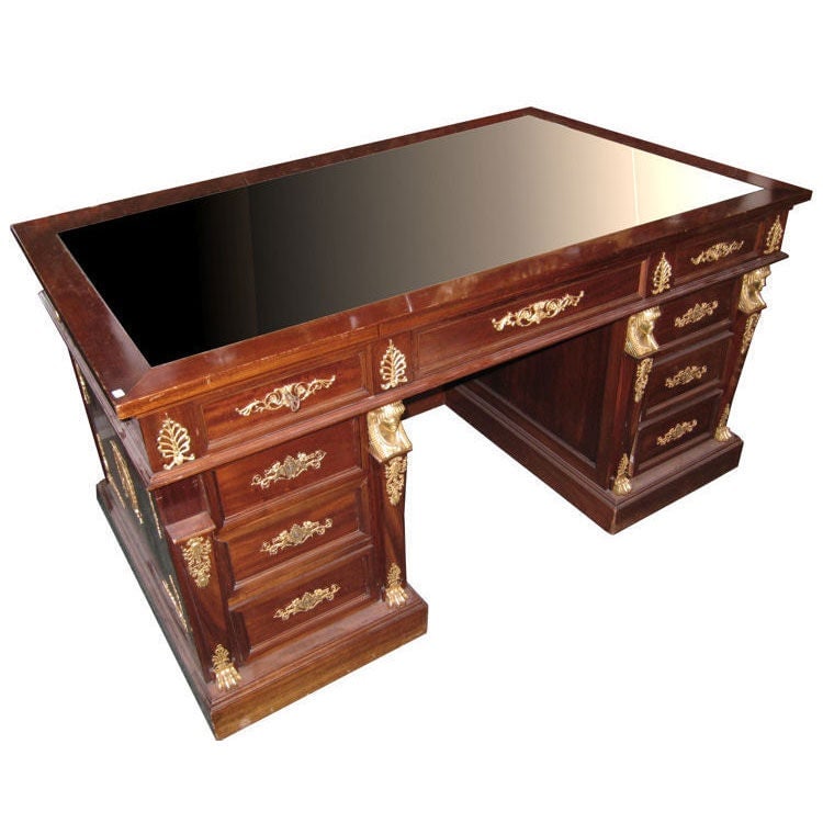 French Empire Mahogany Writing Desk with Gilt Bronze Mounts circa 1900: French Empire Mahogany Writing Desk with Gilt Bronze Mounts circa 1900 This antique French Empire style desk, crafted circa 1900, features a mahogany structure adorned with extensive gilt bronze mount