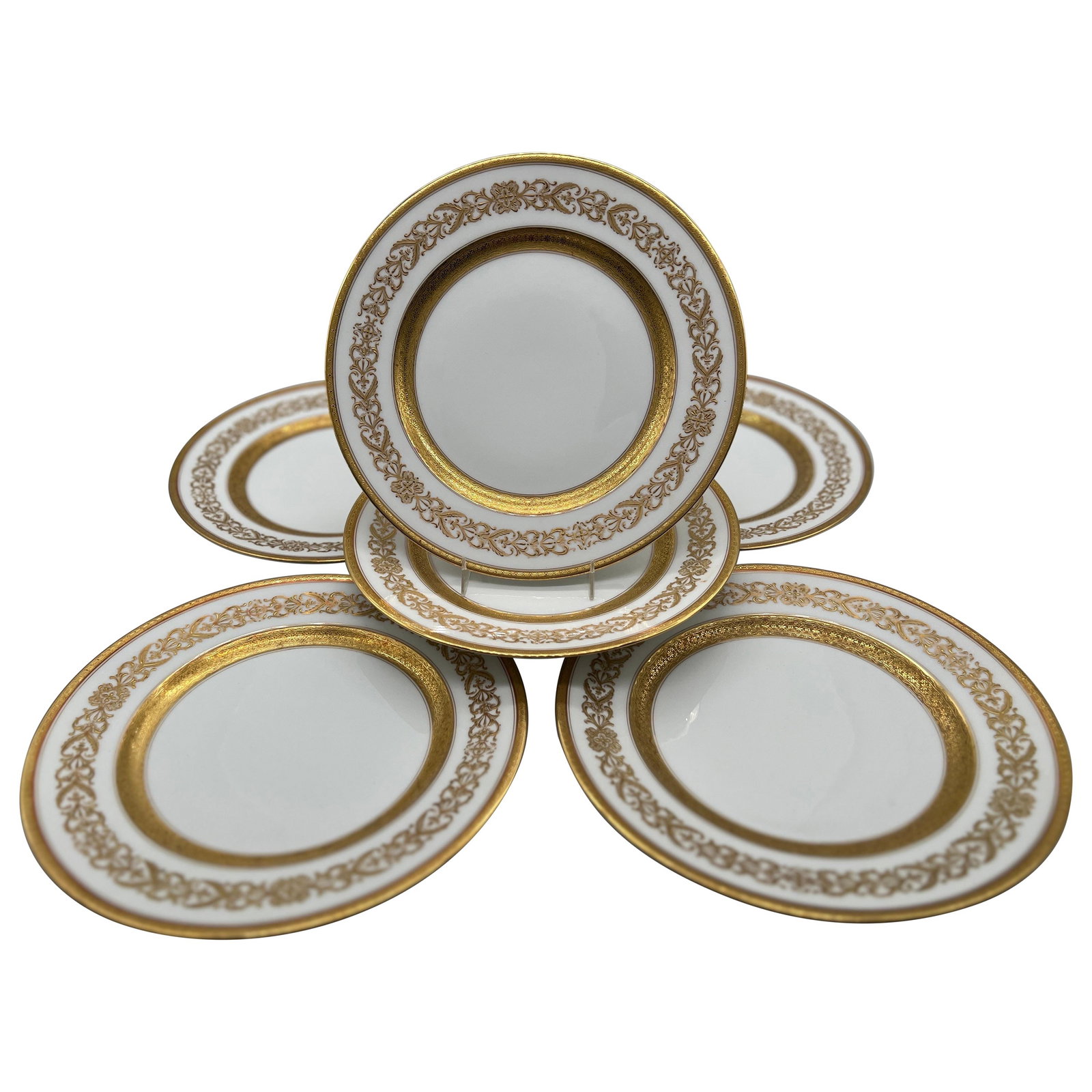 Set of 6 Ahrenfeldt Limoges Gilt Enamel Dinner Plates France 1910: Set of 6 Ahrenfeldt Limoges Gilt Enamel Dinner Plates France 1910 This exquisite set of six dinner plates showcases the artistry of Charles Ahrenfeldt, a renowned Limoges porcelain maker, produced for