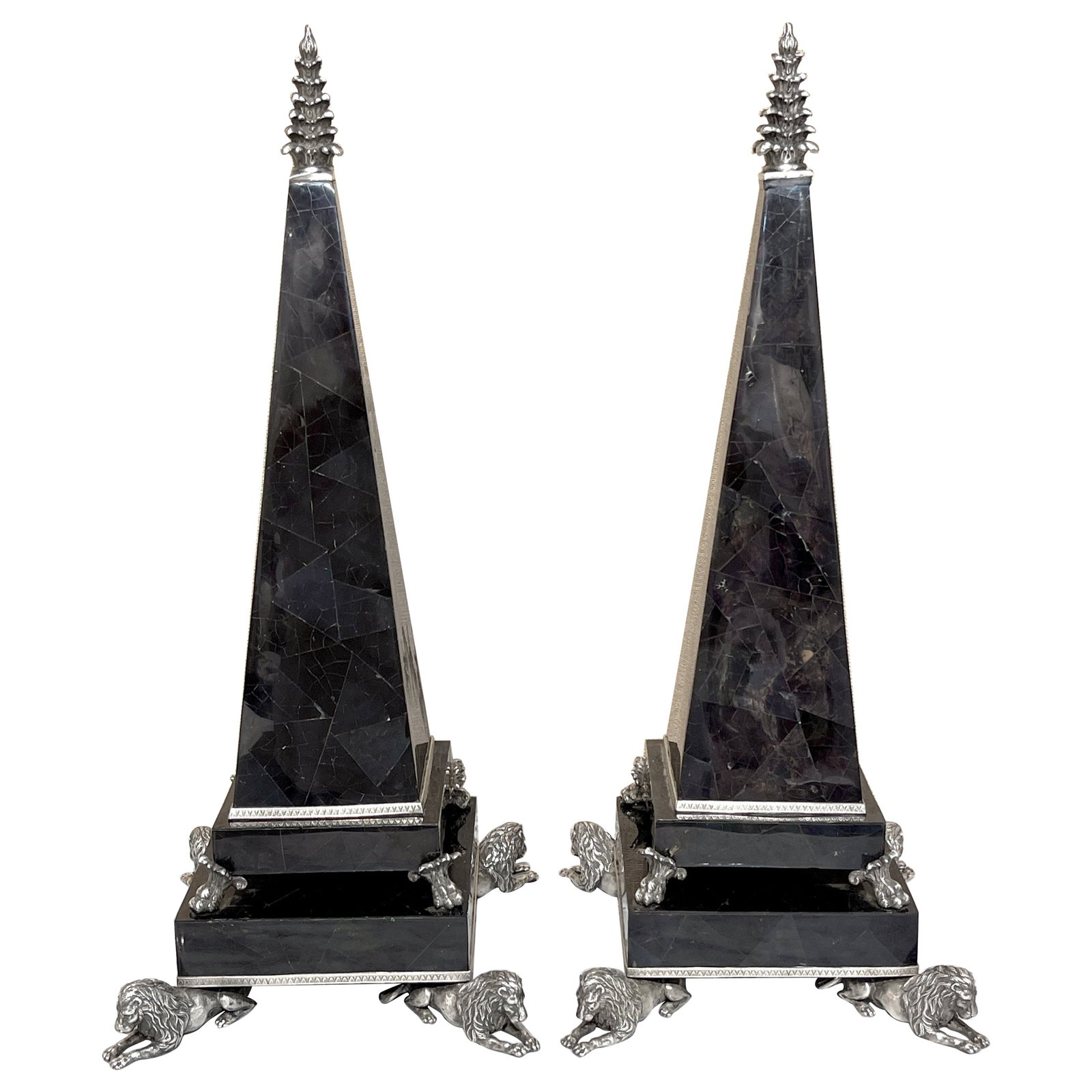 Set of Two Neoclassical Lion Obelisks Silverplated Bronze and Coconut Inlay: Set of Two Neoclassical Lion Obelisks Silverplated Bronze and Coconut Inlay This large pair of Neoclassical obelisks features a striking design by Maitland-Smith from the late 20th century. Each piece