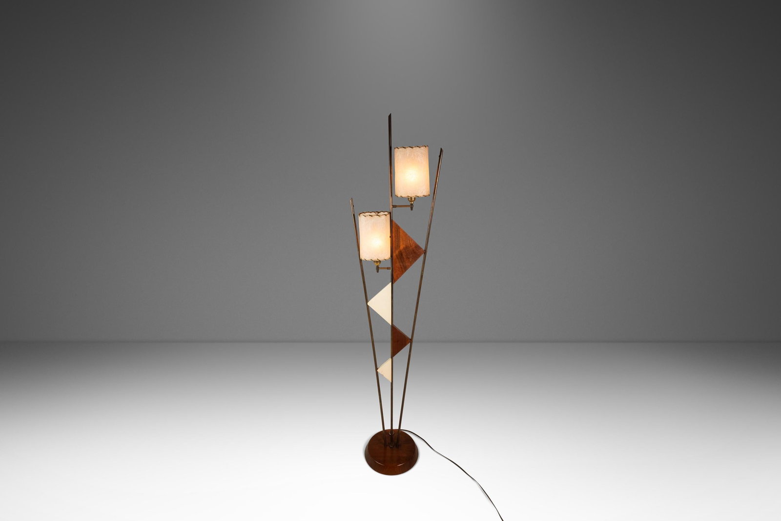 Custom Walnut and Brass Geometric Floor Lamp Atomic Era USA Circa 1950s: Custom Walnut and Brass Geometric Floor Lamp Atomic Era USA Circa 1950s This custom-made floor lamp from the 1950s combines Mid-Century Modern, Art Deco, and Atomic Era influences. Crafted in the USA,