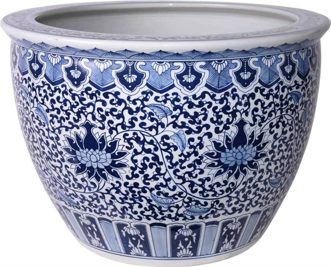 Chinoiserie Blue Porcelain Planter with Sunflowers 17H 25W 25D: Chinoiserie Blue Porcelain Planter with Sunflowers 17H 25W 25D This elegant porcelain planter showcases a beautiful sunflower design, perfect for adding a touch of nature to your home or garden. With 