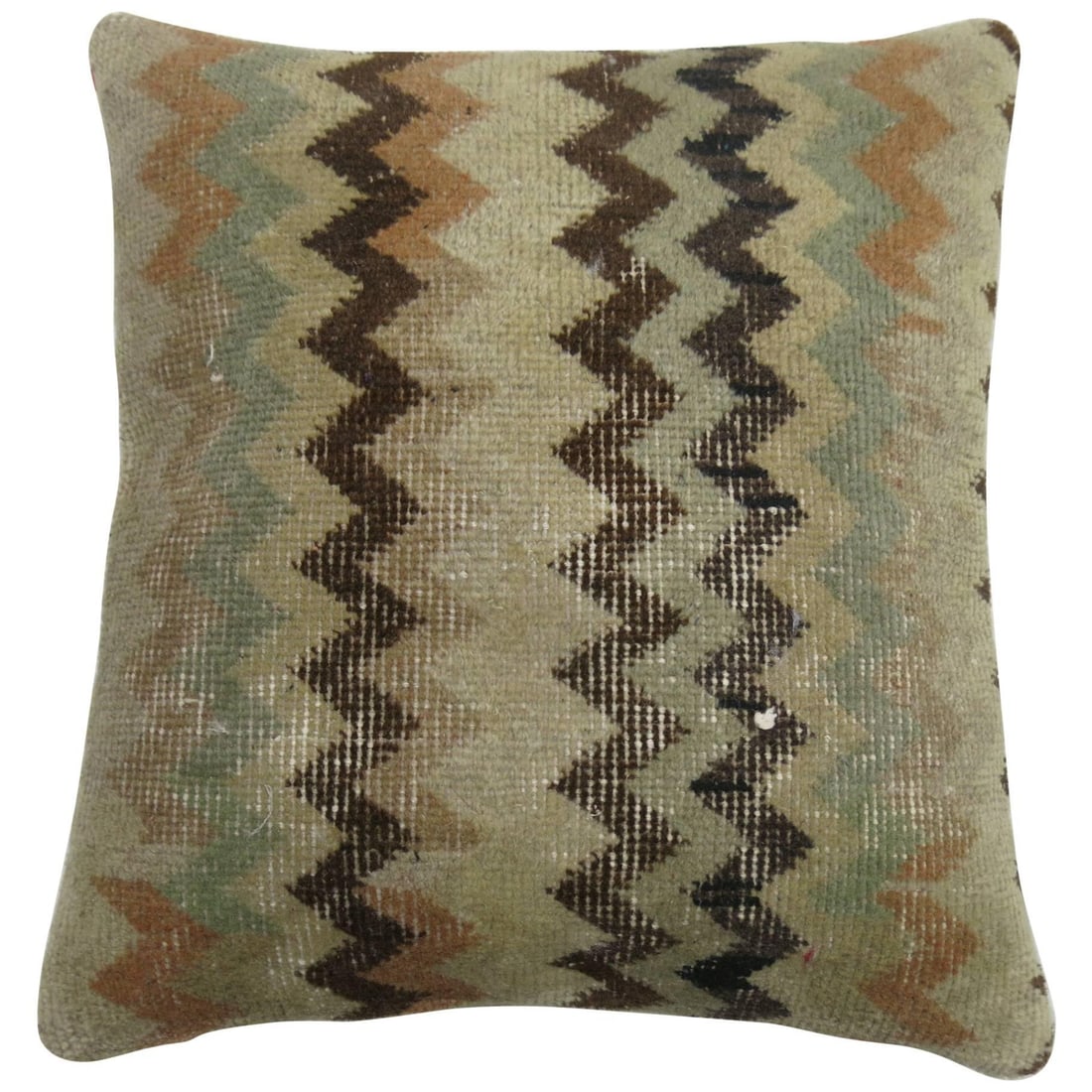 Turkish Anatolian Rug Pillow 17 x 19 Cotton Wool: Turkish Anatolian Rug Pillow 17 x 19 Cotton Wool This pillow is crafted from a Turkish Anatolian rug and features a chevron pattern. It is made using cotton, foam, and wool, reflecting a Mission style