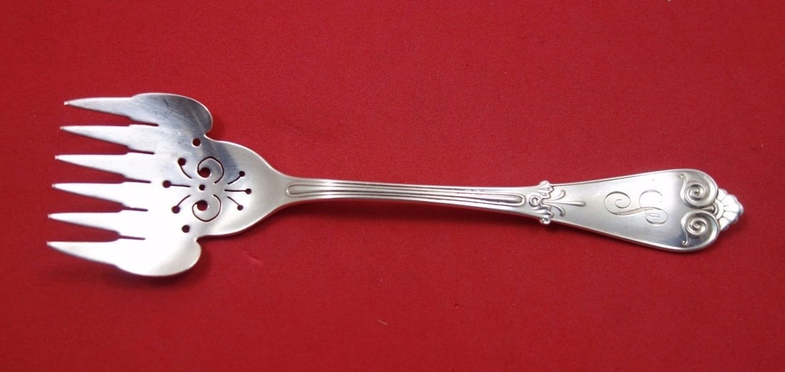 Tiffany & Co Beekman Sterling Silver Sardine Fork 5 5/8" Pierced: Tiffany & Co Beekman Sterling Silver Sardine Fork 5 5/8" Pierced This exquisite Beekman sardine fork by Tiffany & Co. is a remarkable piece of serving silverware. Crafted from high-quality sterling
