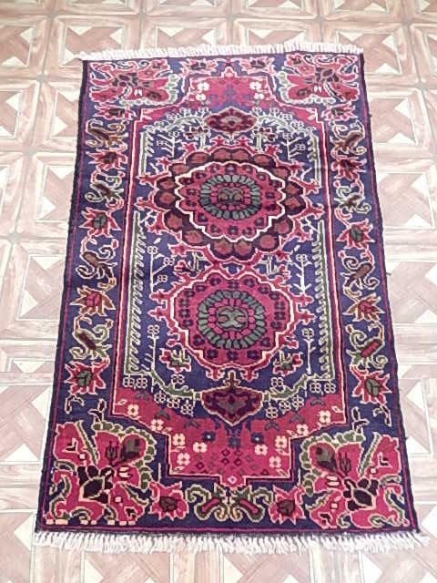 2.5 x 4 Blue Hand-knotted Baluchi Rug in Premium Wool: 2.5 x 4 Blue Hand-knotted Baluchi Rug in Premium Wool Free continental US Shipping Introducing our exquisite 2.5' x 4.0' Blue Knotted Baluchi Rug, a captivating blend of tradition and sophistication. 