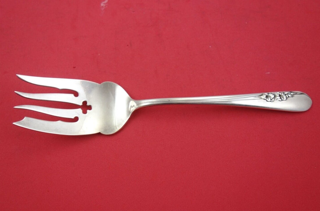 International Blossom Time sterling silver cold meat fork 8 7 8 in: International Blossom Time sterling silver cold meat fork 8 7 8 in This is a sterling silver cold meat fork in the Blossom Time pattern by International. Measuring 8 7/8 inches in length, it features 