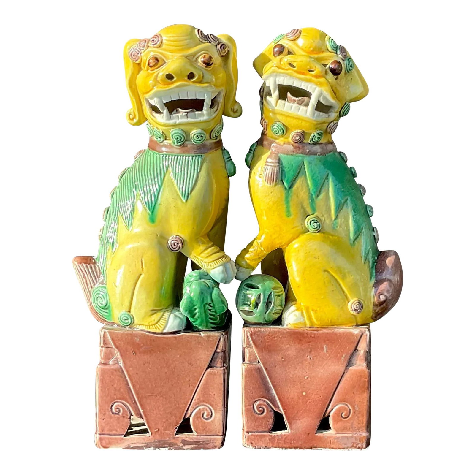 Pair of Vintage Boho 19th Century Glazed Ceramic Foo Dogs: Pair of Vintage Boho 19th Century Glazed Ceramic Foo Dogs This exquisite pair of vintage Boho foo dogs showcases a chic glazed ceramic finish in a striking 19th Century gold color. Perfect for adding 
