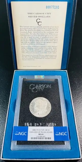 1880/79 CC Morgan Silver Dollar NGC MS 64 GSA Hoard with COA: 1880/79 CC Morgan Silver Dollar NGC MS 64 GSA Hoard with COA This 1880/79 CC Morgan Silver Dollar is a remarkable piece of numismatic history, showcasing both beauty and value. Graded NGC MS-64, it is
