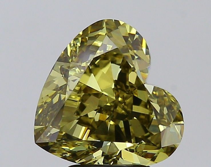 Loose Diamond - HEART 5.01ct Fancy Gray Yellow VS1: Loose Diamond - HEART 5.01ct Fancy Gray Yellow VS1 Source: This is a real non-mined Diamond that has been grown in a lab Shape: HEART Carats: 5.01 Color: Fancy Gray Yellow Certification: IGI Video: