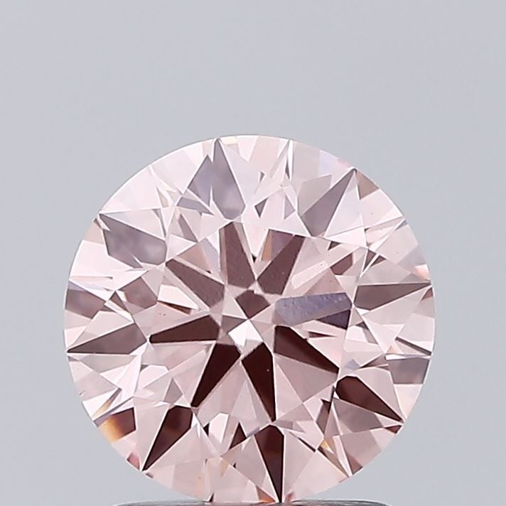 Ideal Loose Diamond - ROUND 1.79ct Fancy Vivid Pink VS1: Ideal Loose Diamond - ROUND 1.79ct Fancy Vivid Pink VS1 Source: This is a real non-mined Diamond that has been grown in a lab Shape: ROUND Carats: 1.79 Color: Fancy Vivid Pink Certification: IGI