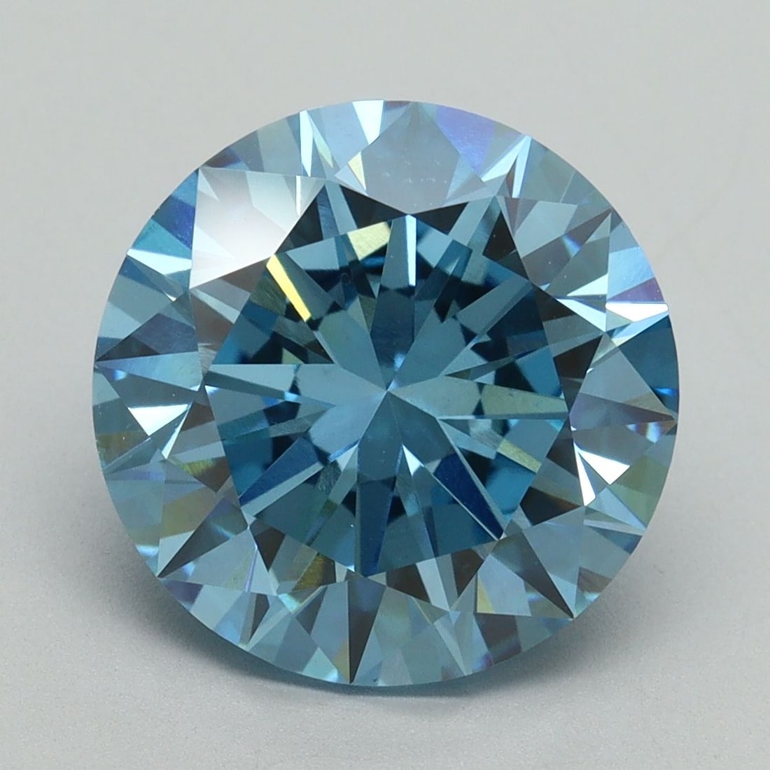 Loose Diamond - ROUND 5.52ct Fancy Vivid Blue VS1: Loose Diamond - ROUND 5.52ct Fancy Vivid Blue VS1 Source: This is a real non-mined Diamond that has been grown in a lab Shape: ROUND Carats: 5.52 Color: Fancy Vivid Blue Certification: IGI Video: