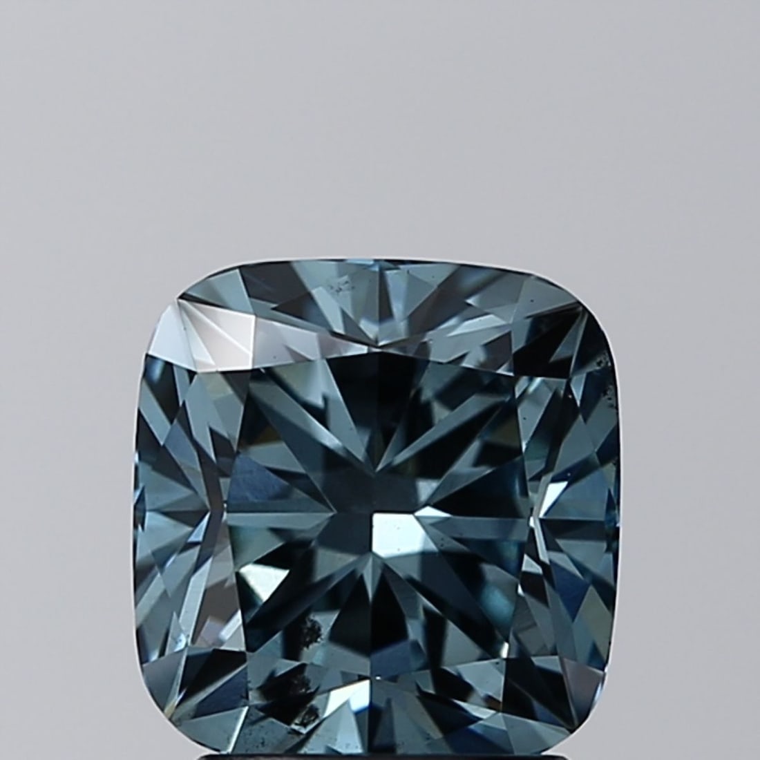 Loose Diamond - CUSHION BRILLIANT 2.03ct Fancy Vivid Green Blue SI1: Loose Diamond - CUSHION BRILLIANT 2.03ct Fancy Vivid Green Blue SI1 Source: This is a real non-mined Diamond that has been grown in a lab Shape: CUSHION BRILLIANT Carats: 2.03 Color: Fancy Vivid Green