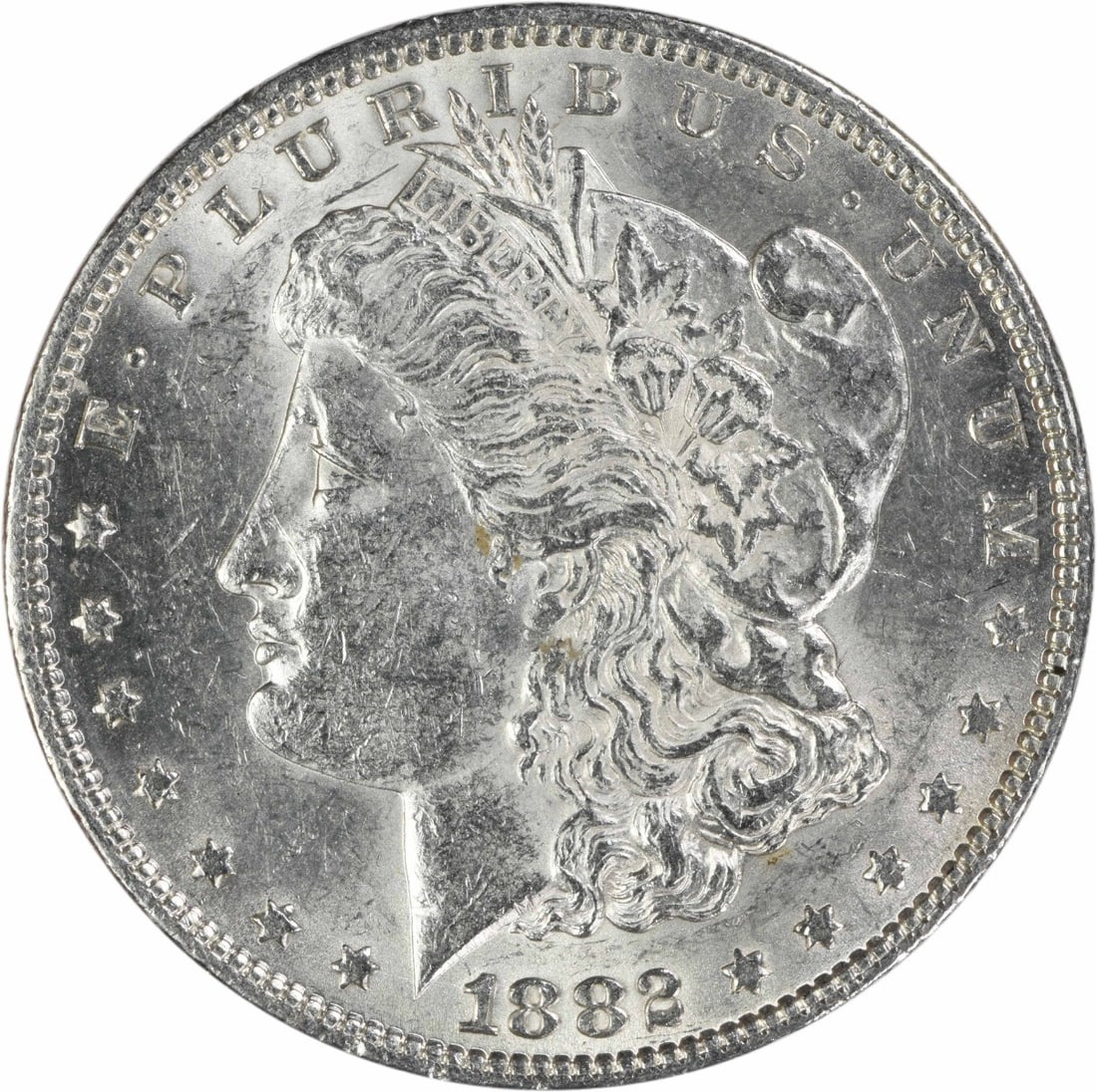 1882 Philadelphia Morgan Dollar 90 Silver AU Uncertified: 1882 Philadelphia Morgan Dollar 90 Silver AU Uncertified This is an 1882 Morgan Silver Dollar from the Philadelphia Mint, featuring the iconic design by George T. Morgan. Composed of 90% silver and 10