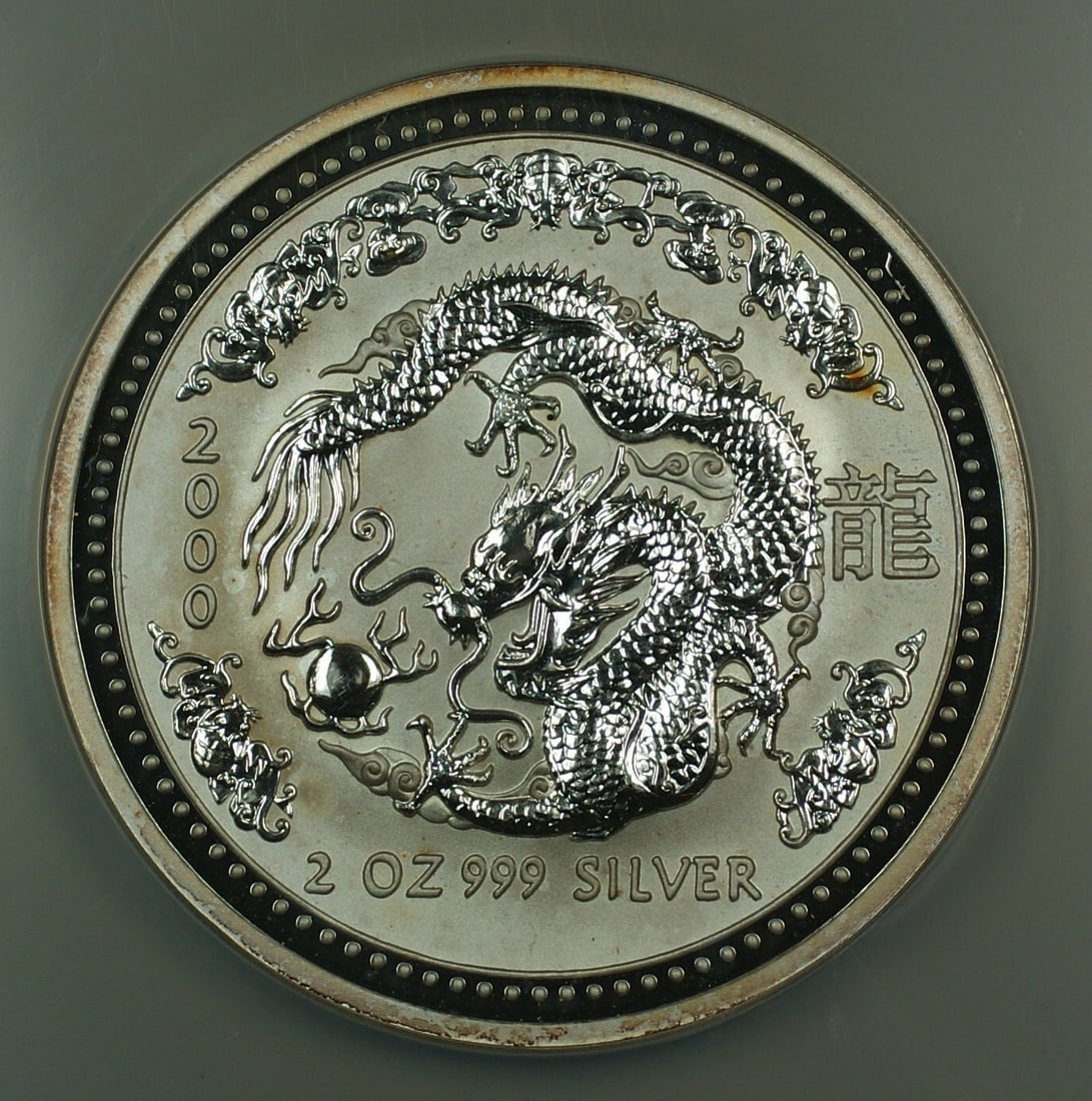 2 oz 2000 Silver Dragon Coin NGC MS-66 Australia $2 Large Holder: 2 oz 2000 Silver Dragon Coin NGC MS-66 Australia $2 Large Holder This 2000 Australia $2 Dragon coin is struck in 2 ounces of .999 fine silver. Certified by NGC with a grade of MS 66, this uncirculated