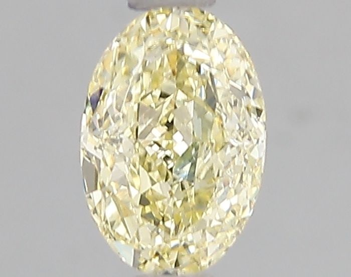 Loose Diamond - OVAL 1.06ct Fancy Yellow VS1: Loose Diamond - OVAL 1.06ct Fancy Yellow VS1 Source: This is a real non-mined Diamond that has been grown in a lab Shape: OVAL Carats: 1.06 Color: Fancy Yellow Certification: IGI Video: