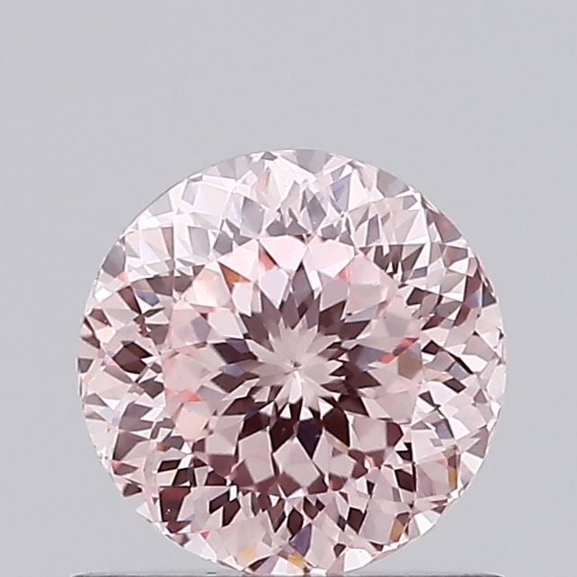 Loose Diamond - ROUND 0.66ct Fancy Intense Pink VS1: Loose Diamond - ROUND 0.66ct Fancy Intense Pink VS1 Source: This is a real non-mined Diamond that has been grown in a lab Shape: ROUND Carats: 0.66 Color: Fancy Intense Pink Certification: IGI Video: