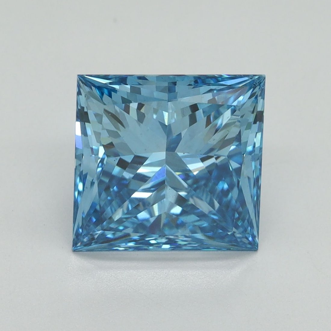 Loose Diamond - PRINCESS 4.01ct Fancy Vivid Blue VS2: Loose Diamond - PRINCESS 4.01ct Fancy Vivid Blue VS2 Source: This is a real non-mined Diamond that has been grown in a lab Shape: PRINCESS Carats: 4.01 Color: Fancy Vivid Blue Certification: IGI Video