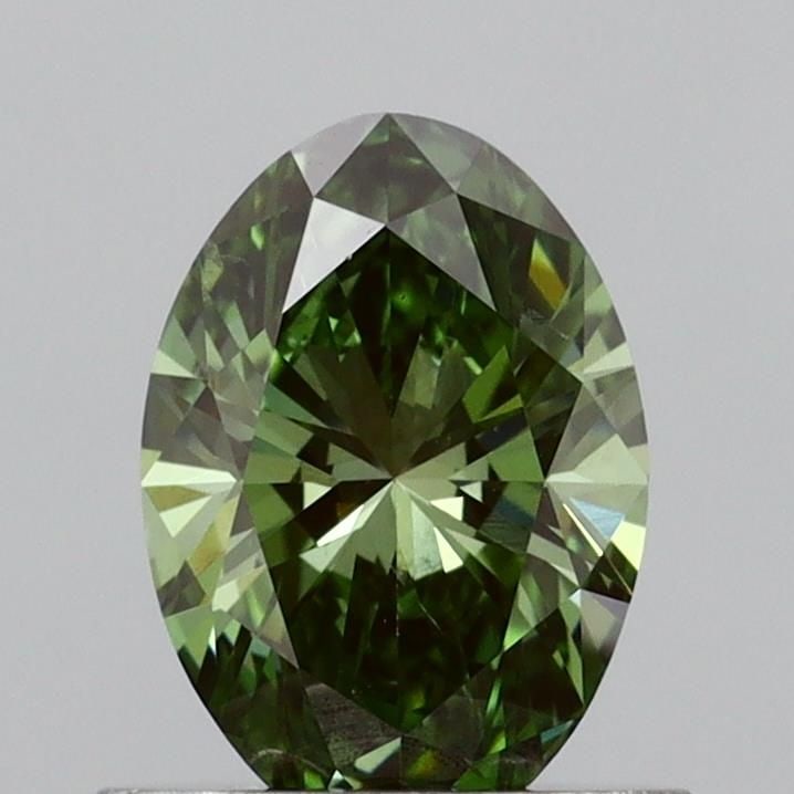 Loose Diamond - OVAL 0.71ct Fancy Vivid Green VS2: Loose Diamond - OVAL 0.71ct Fancy Vivid Green VS2 Source: This is a real non-mined Diamond that has been grown in a lab Shape: OVAL Carats: 0.71 Color: Fancy Vivid Green Certification: IGI Video:
