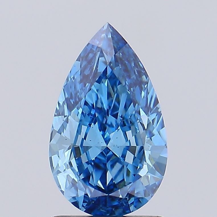 Loose Diamond - PEAR 1.24ct Fancy Vivid Blue VS2: Loose Diamond - PEAR 1.24ct Fancy Vivid Blue VS2 Source: This is a real non-mined Diamond that has been grown in a lab Shape: PEAR Carats: 1.24 Color: Fancy Vivid Blue Certification: NONE Video:
