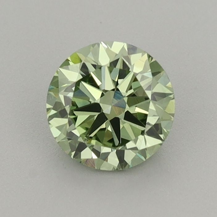 Loose Diamond - ROUND 0.72ct Fancy Vivid Green VS1: Loose Diamond - ROUND 0.72ct Fancy Vivid Green VS1 Source: This is a real non-mined Diamond that has been grown in a lab Shape: ROUND Carats: 0.72 Color: Fancy Vivid Green Certification: IGI Video: