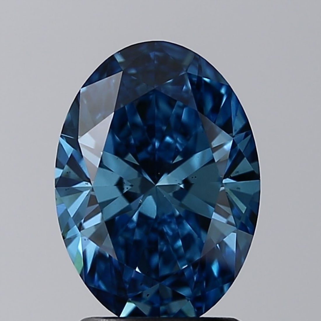 Loose Diamond - OVAL 2.01ct Fancy Vivid Blue VS2: Loose Diamond - OVAL 2.01ct Fancy Vivid Blue VS2 Source: This is a real non-mined Diamond that has been grown in a lab Shape: OVAL Carats: 2.01 Color: Fancy Vivid Blue Certification: IGI Video: Video