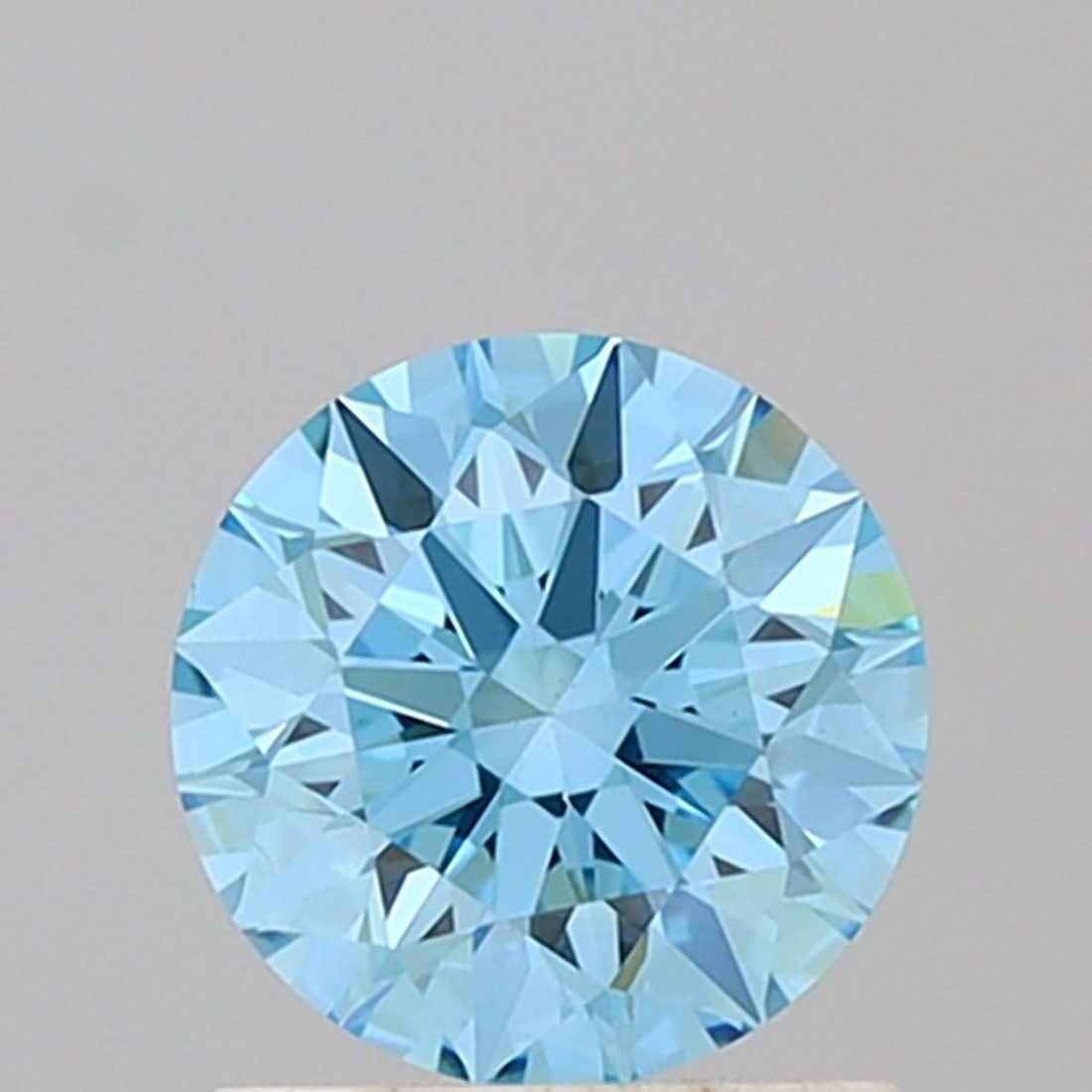 Ideal Loose Diamond - ROUND 1.08ct Fancy Vivid Blue VS1: Ideal Loose Diamond - ROUND 1.08ct Fancy Vivid Blue VS1 Source: This is a real non-mined Diamond that has been grown in a lab Shape: ROUND Carats: 1.08 Color: Fancy Vivid Blue Certification: IGI