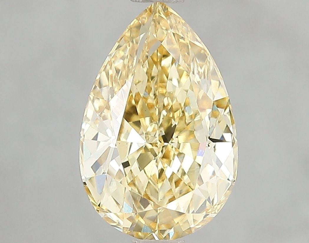 Loose Diamond - PEAR 3.08ct Fancy Intense Yellow VS1: Loose Diamond - PEAR 3.08ct Fancy Intense Yellow VS1 Source: This is a real non-mined Diamond that has been grown in a lab Shape: PEAR Carats: 3.08 Color: Fancy Intense Yellow Certification: IGI Video