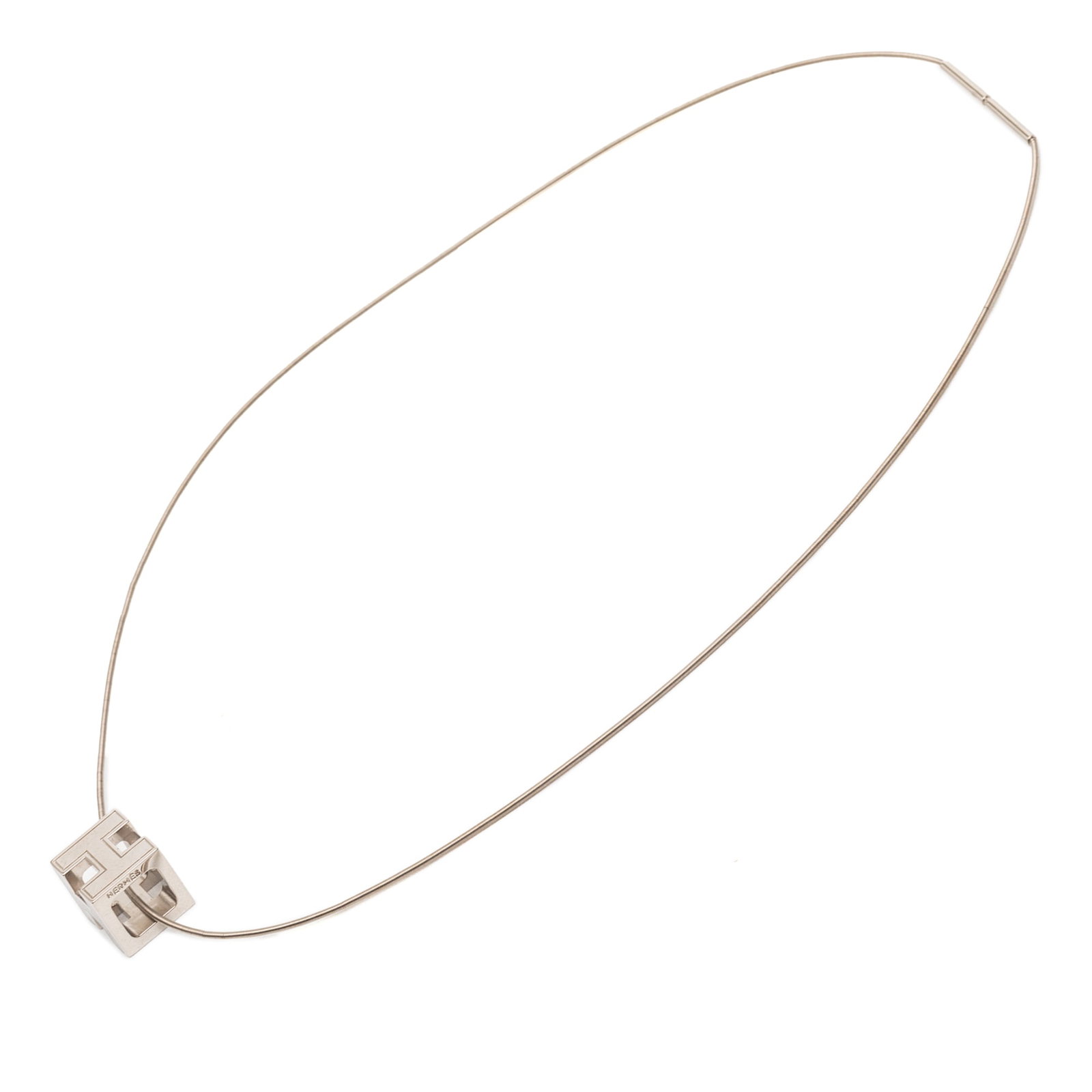 Hermes enamel cage dH cube necklace palladium plated snake chain: Hermes enamel cage dH cube necklace palladium plated snake chain This Hermes necklace features a palladium plated metal body and pendant with enamel accents, complemented by a snake chain and a slide-